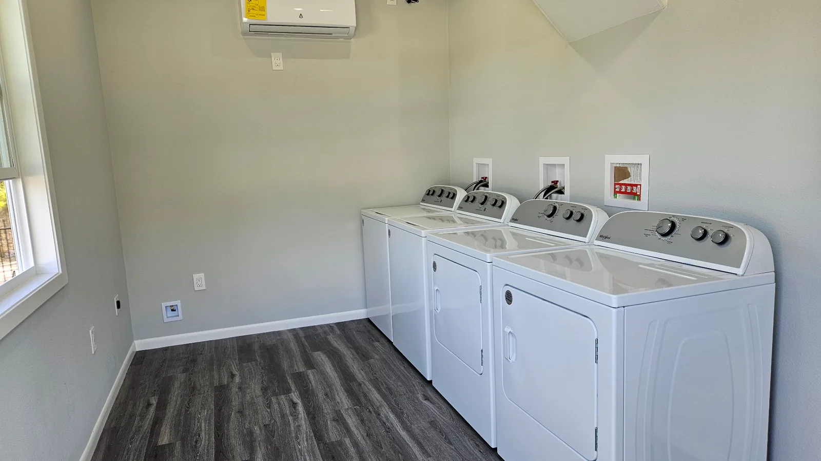 On-site laundry room with washers and dryers