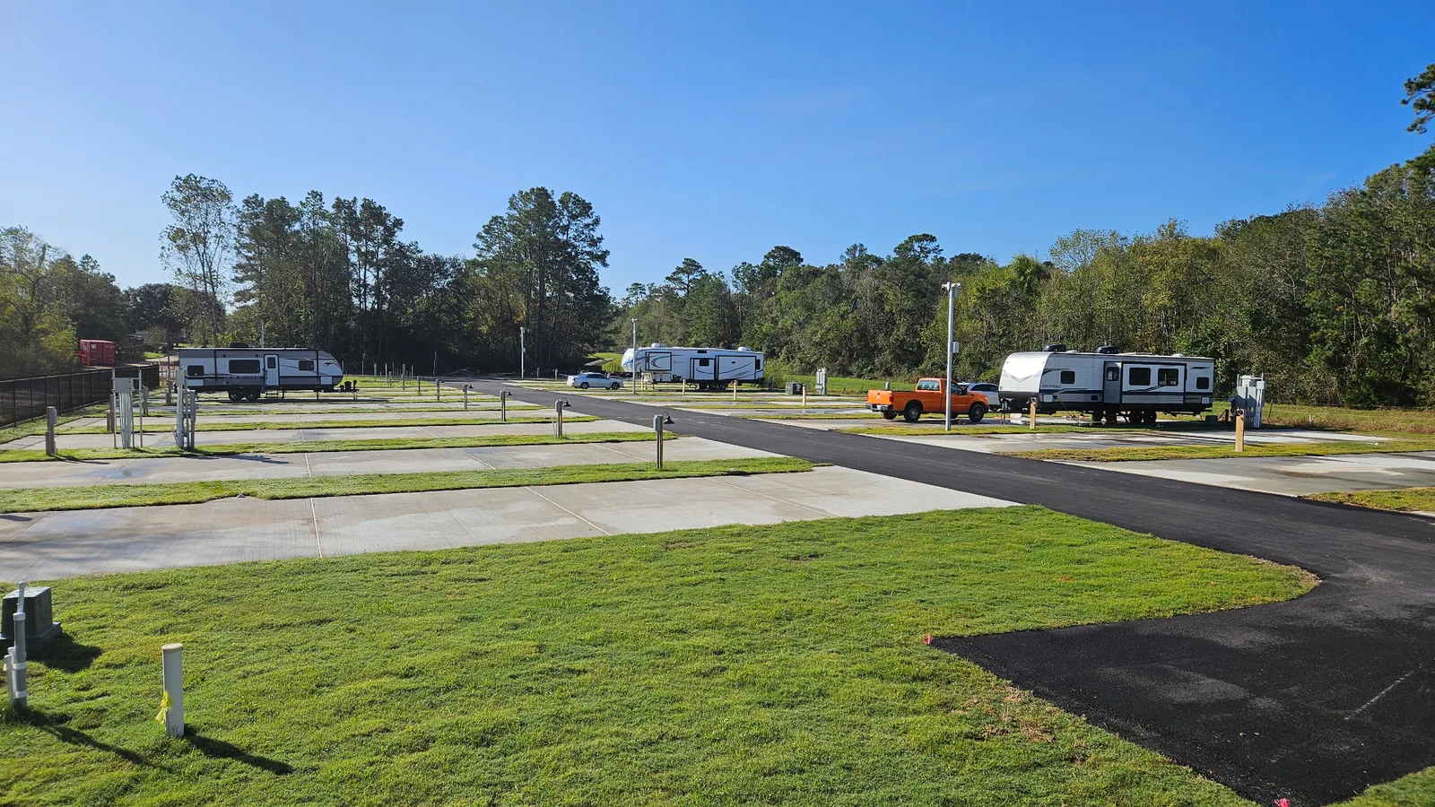 Pull-through RV sites with paved roads and full hookups at Gleneagles RV Resort